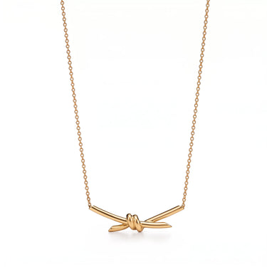 Knot Radiant Crossed Pendant Necklace
