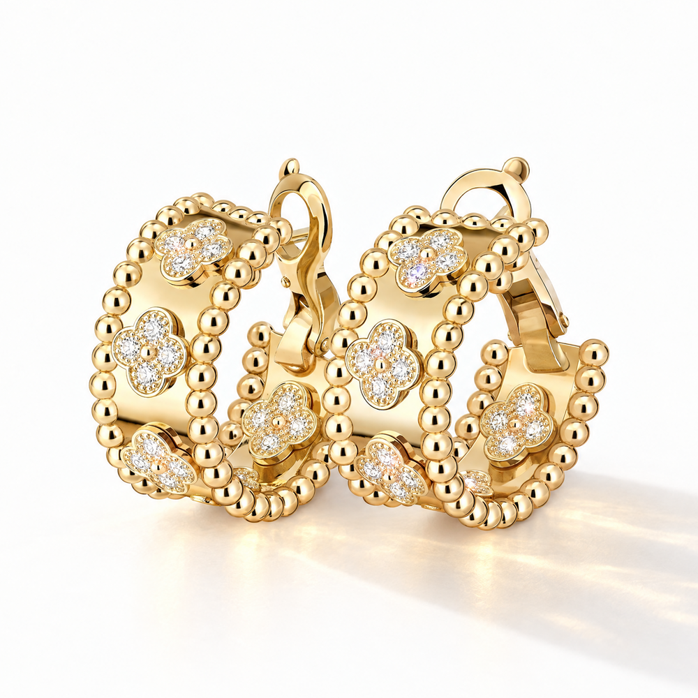 Yellow gold beaded hoop earrings with diamond clovers